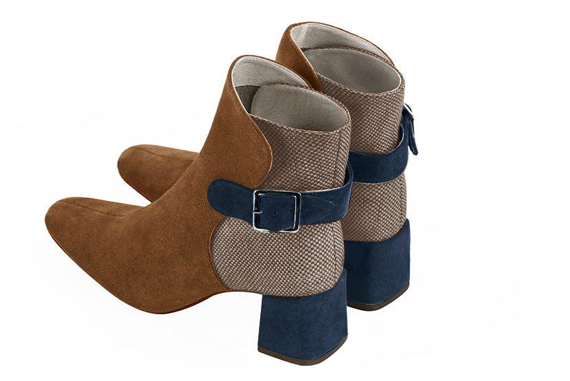 Caramel brown, tan beige and navy blue women's ankle boots with buckles at the back. Square toe. Medium block heels. Rear view - Florence KOOIJMAN